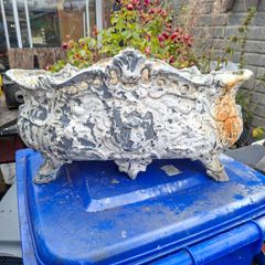 Very Large Heavy Antique French Cast Iron Outdoor Planter, featuring ornate Rococo or Louis XV style decorations, organic scrolls, and swags Luxury Flower Holder of its time