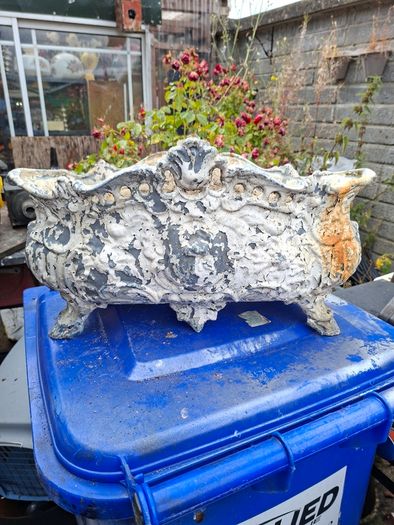 Very Large Heavy Antique French Cast Iron Outdoor Planter, featuring ornate Rococo or Louis XV style decorations, organic scrolls, and swags Luxury Flower Holder of its time