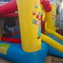 Happy Hop clown-themed bouncy castle with blower Image 2