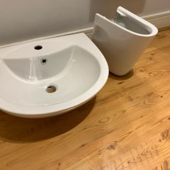 Wash basin with semi pedestal