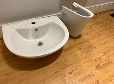 Wash basin with semi pedestal