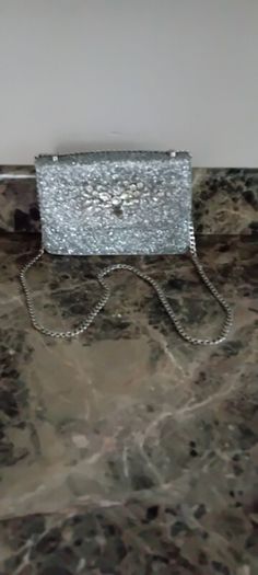 silver sandals and bag