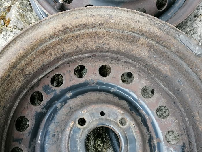 2 x steel rims 15", 4 stud, about 114mm ish from hole centre to the opposite home centre... Possibly fit a nissan etc