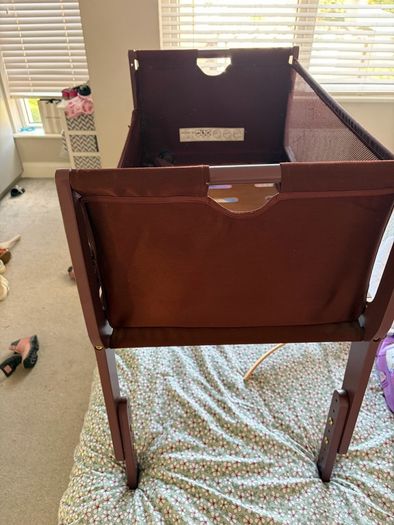 Snuzpod burgundy next to me crib