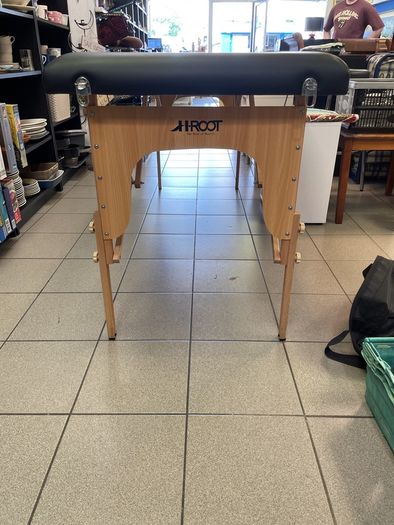 Massage table