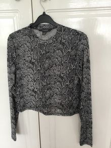 Black and white leopard print top. Size M 12/14