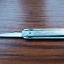Vintage tri-fold pocket knife features a "COMPLIMENTS MUSGRAVE & CO LTD" engraving made by Warriss Sheffield England Image 5