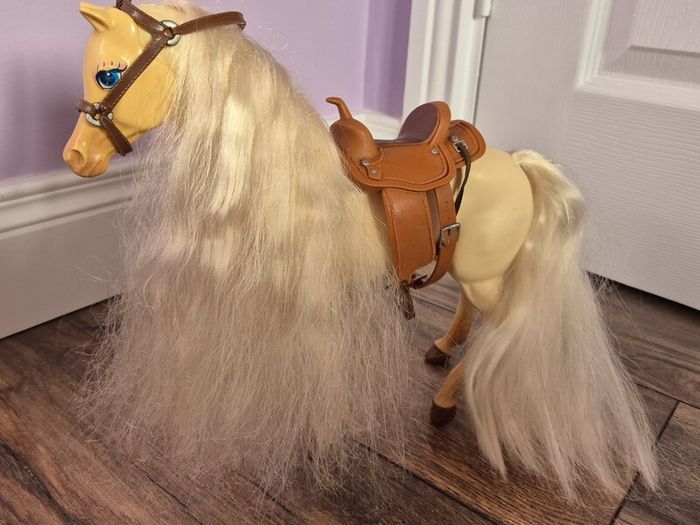 Big plastic toy horse with a gorgeous mane