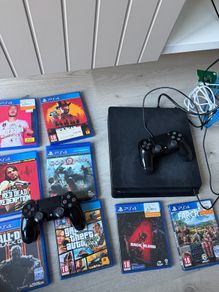 PS4 500GB + Games & 2 Controllers