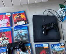 PS4 500GB + Games & 2 Controllers