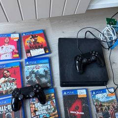 PS4 500GB + Games & 2 Controllers