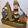 Wooden lighthouse coastal scene! Image 3