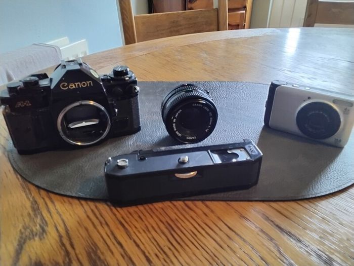 canon A-1 with 50mm lens & winder, also canon power shot A3000 both for spairs/ repair