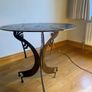 Unique artisan metal side table with native motifs Image 3