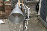 floor lamp This mid-century vintage industrial  floor lamp features twin adjustable reflectors (one fixed pole mount and one clamp-on mount).