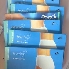 7 packs of Sloggi maxi briefs size 12/14