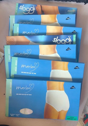 7 packs of Sloggi maxi briefs size 12/14