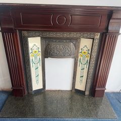 Traditional timber fireplace surround with cast iron insert, decorative tiled side panels and marble-effect hearth, all included. - Moate