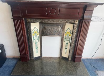 Traditional timber fireplace surround with cast iron insert, decorative tiled side panels and marble-effect hearth, all included. - Moate