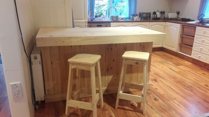 Rustic kitchen island with overhang