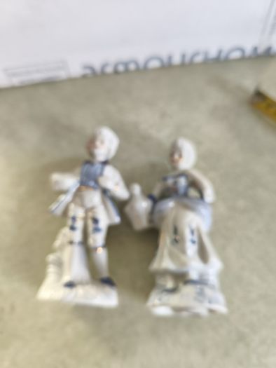 Vintage colonial man & woman blue, white, gold porcelain