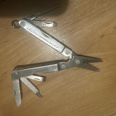 leatherman micra , fishing camping USA made stamp edc mini tool