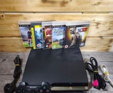 Playstation PS3 console + 4 controllers + 7 games
