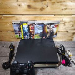Playstation PS3 console + 4 controllers + 7 games
