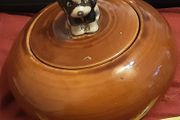 brown lidded bowl with dog on lid