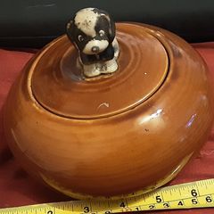 brown lidded bowl with dog on lid