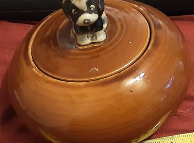 brown lidded bowl with dog on lid
