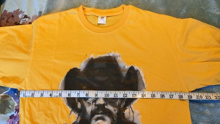 Lemmy from Motorhead t-shirt. Amazing print Brand new.It's a medium on the tag but it would be more of a small to a slim medium.
