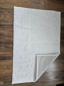 White floor mat with rubber backing