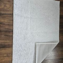 White floor mat with rubber backing