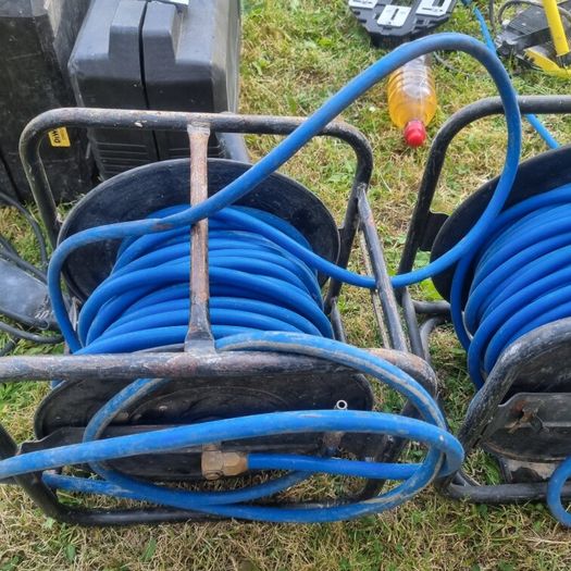 nail guns and 2 hose reels