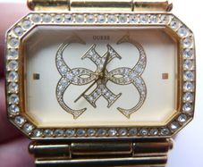 GUESS Women's Gold-Tone Chain Bracelet Watch Guess works well