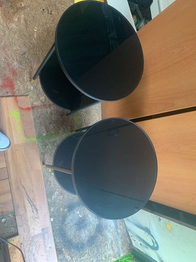 Two black glass tables