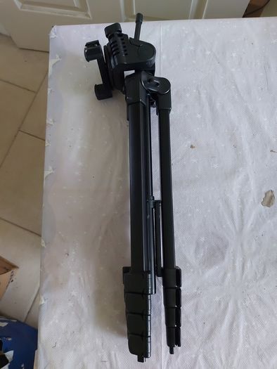 Camera Tripod with multiple extensions for increasing height and in excellent condition