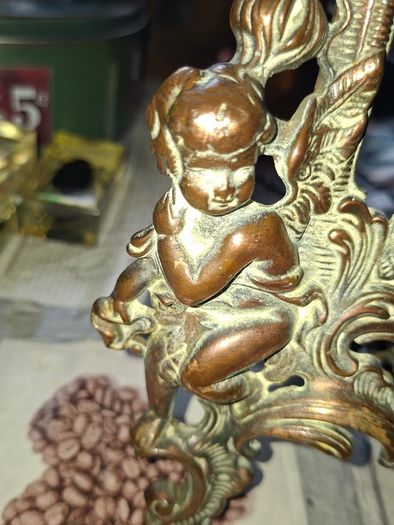 Beautiful Pair of Antique Art Nouveau Beatrice. Bronzed Photo Frames Cherub. a stunning lady lies on the top of the frame with beautiful scrollwork descending down the frame to a winged Cupid or Angel