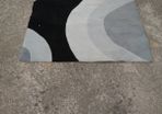 High quality 100% wool  rug, grey and black abstract design.