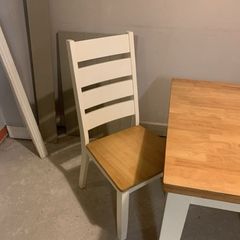 Oak and cream table and four chairs.