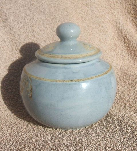 A studio pottery vase with its lid (excellent condition, no damage).
