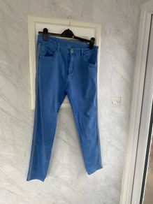 Ladies blue jeans with side embellishments