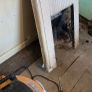 Cast iron fireplace with cream speckled enamel finish. Image 2