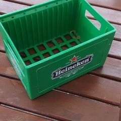 heineken Cd/dvd grate holder, buyer collects or pays postage, sold as seen ,check pictures for condition, nice advertising display item.