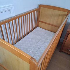 Cot including mattress and protective cover