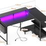 L Shaped Gaming Desk with LED Lights, 120 x 80 cm Computer Desk with Power Outlet, Reversible Corner Gaming Table with Storage Shelves & Monitor Stand, Black Image 2