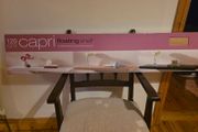 Capri 120cm floating wall shelf in a light oak-effect finish.