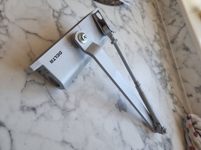 Delta door closer