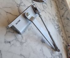 Delta door closer